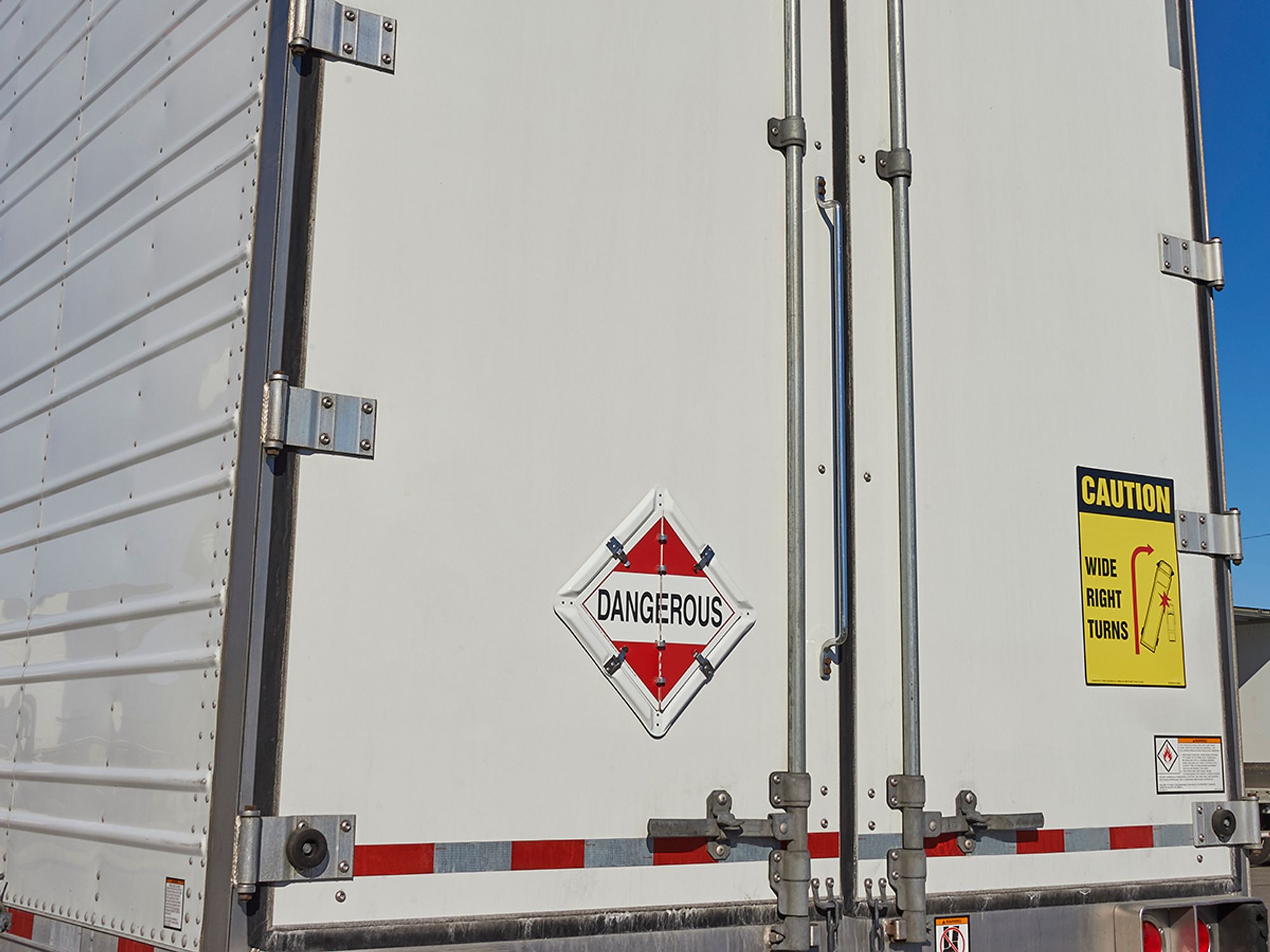 Who regulates the transportation of hazardous materials in the US?