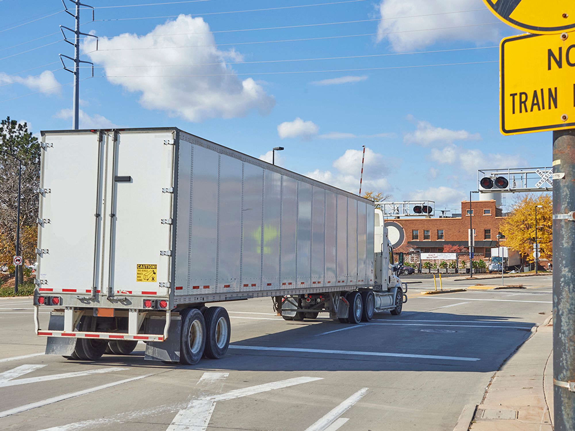 Operational requirements: railroad crossings and hazardous driving conditions
