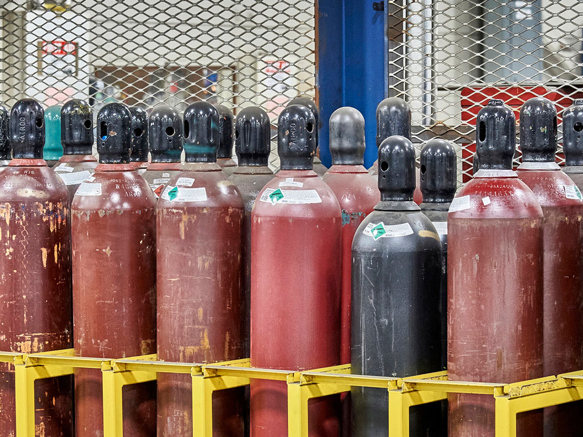 Transporting, moving, and storing compressed gas cylinders