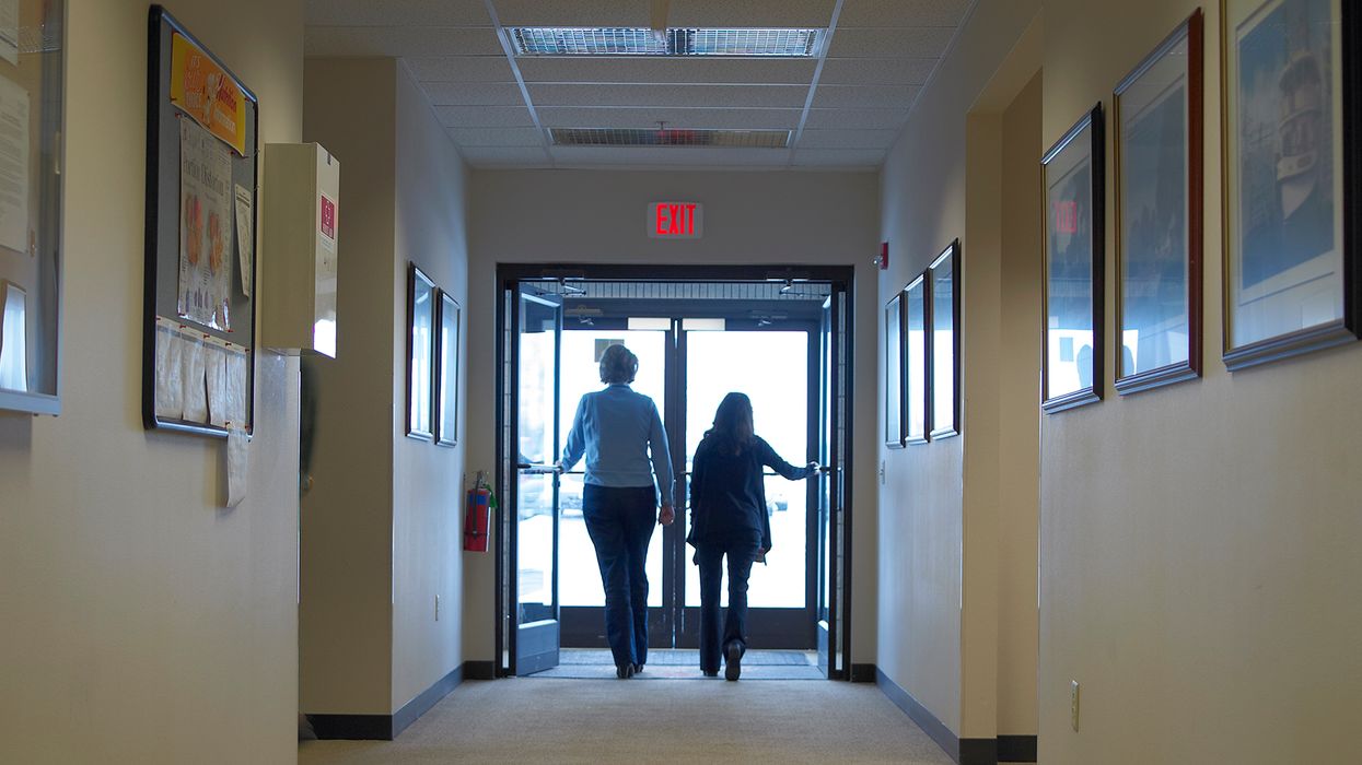Green or red exit signs still meet the definition of distinctive