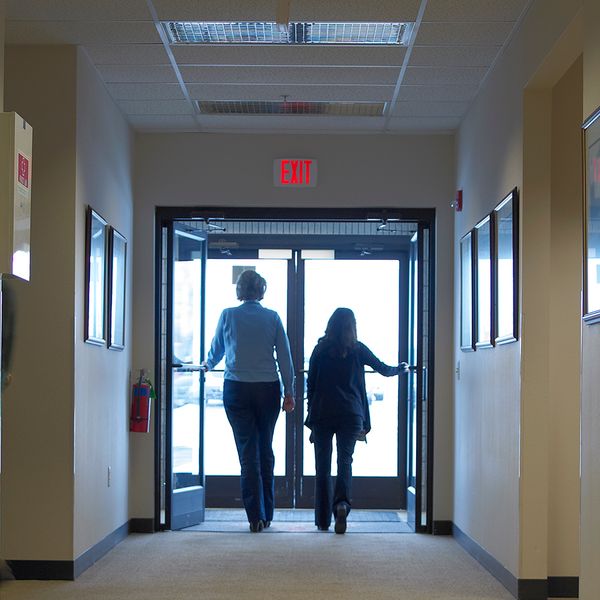 Green or red exit signs still meet the definition of distinctive