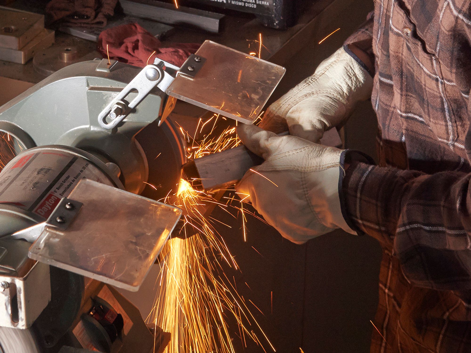 What are the OSHA requirements for grinding machines?