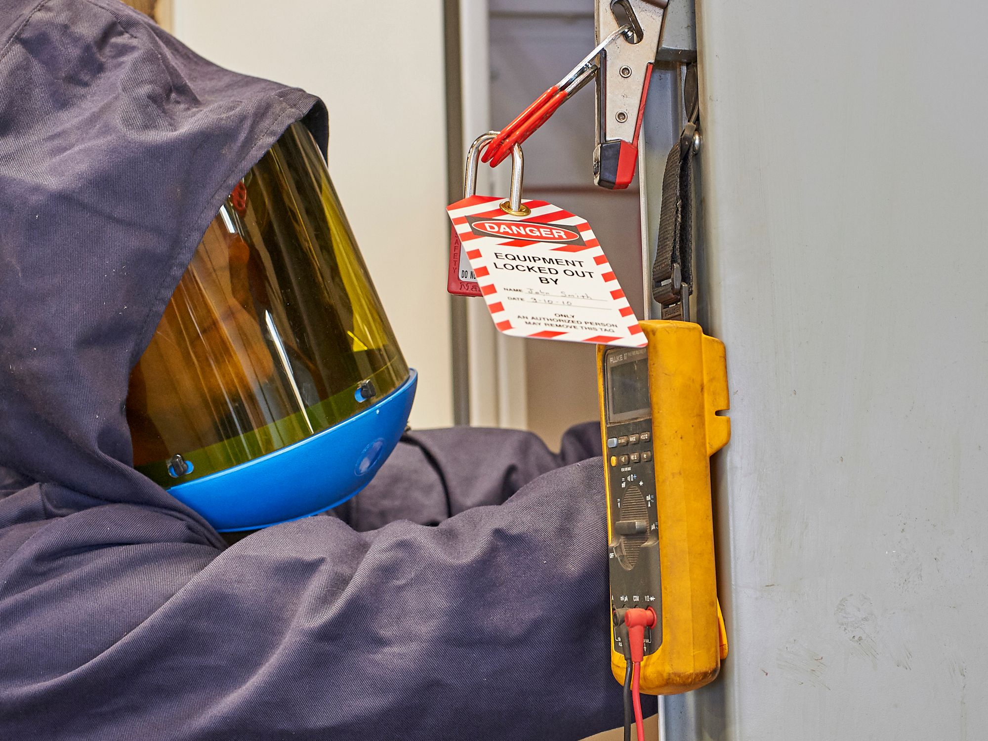 How can employees be protected from electric shock and arc flash and blast?