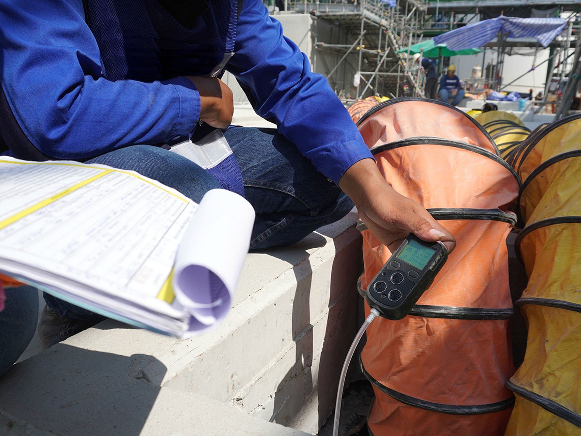 What atmospheric hazards can exist in confined spaces?