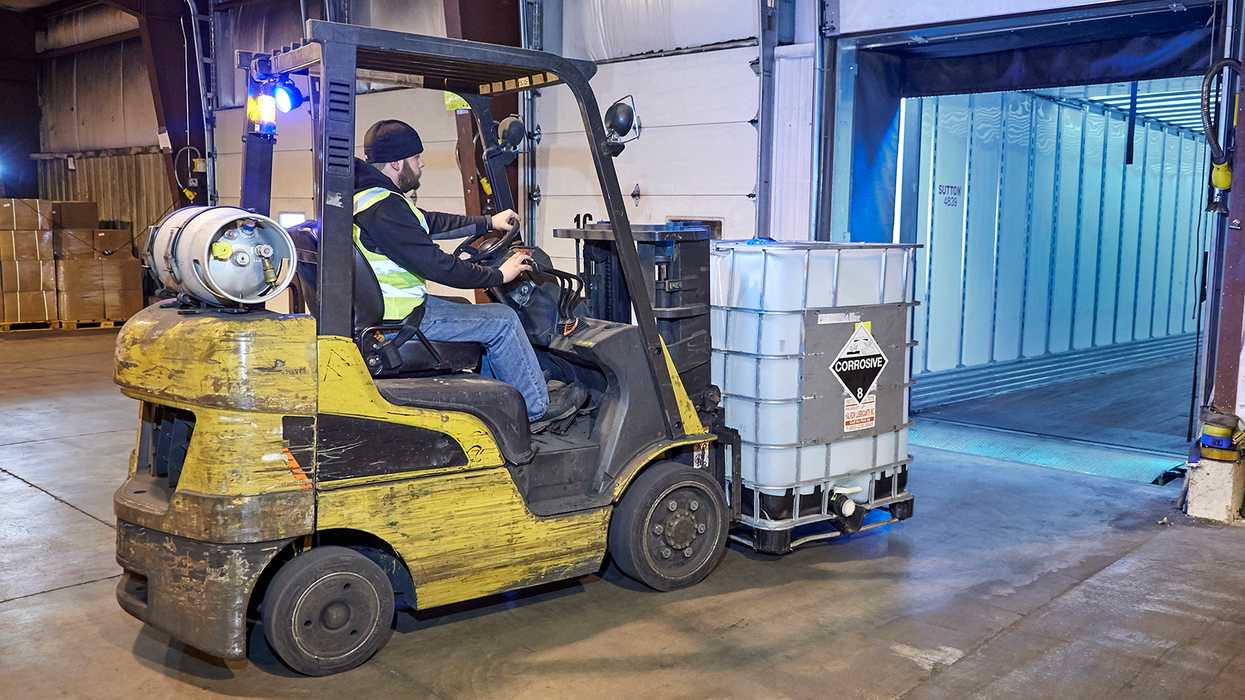 In dimly lit areas, OSHA requires auxiliary lighting on PITs