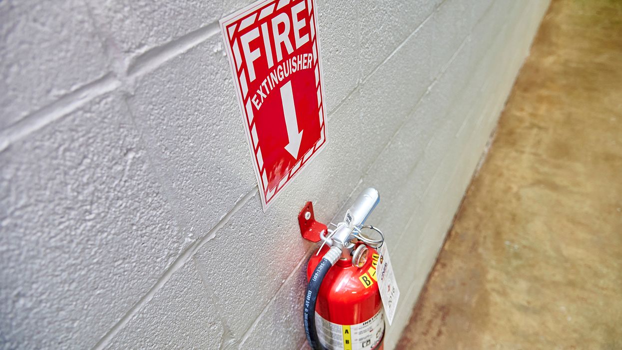 The portable fire extinguisher triad — defining “readibly accessible”