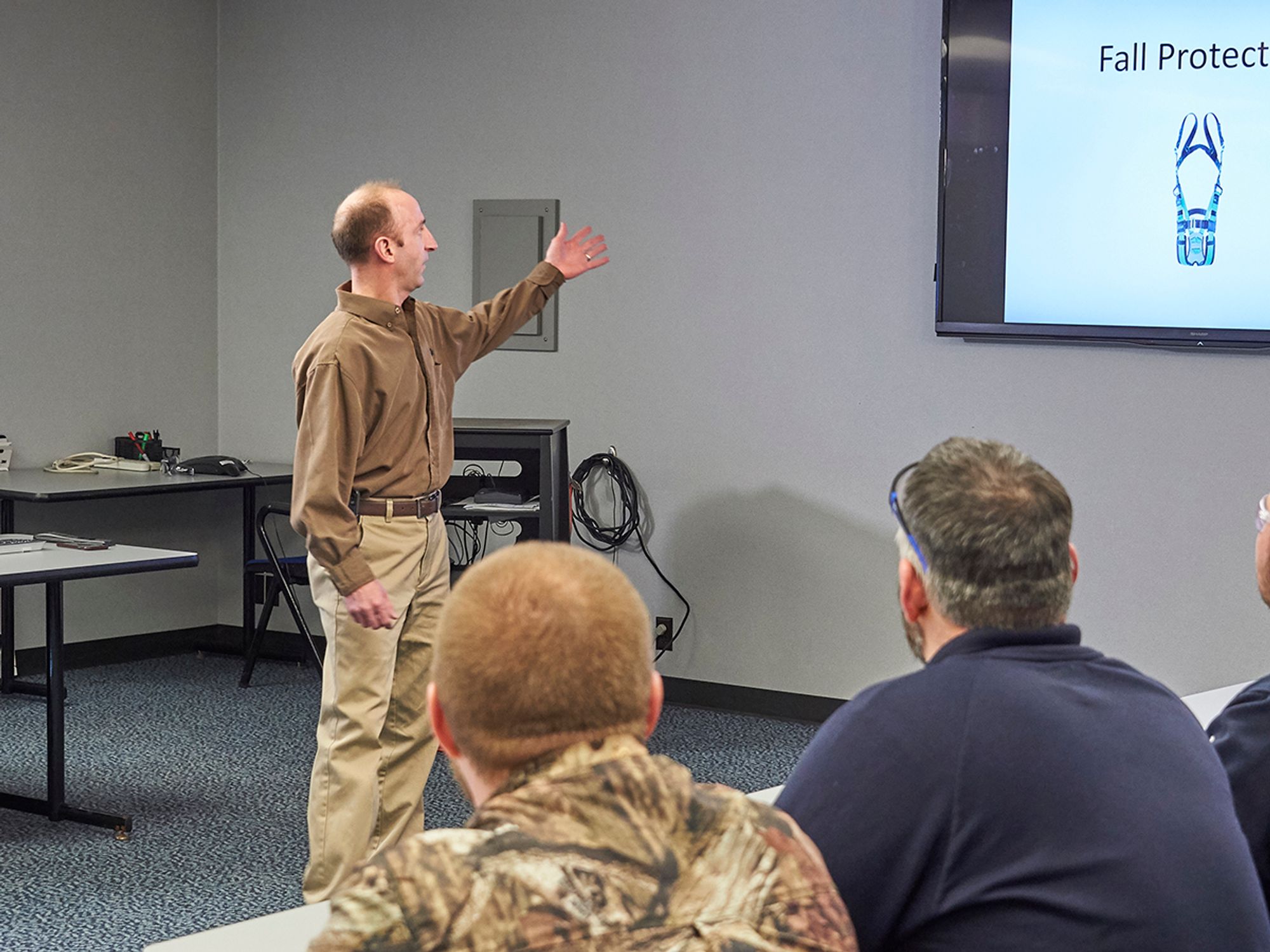 Who must conduct the training?