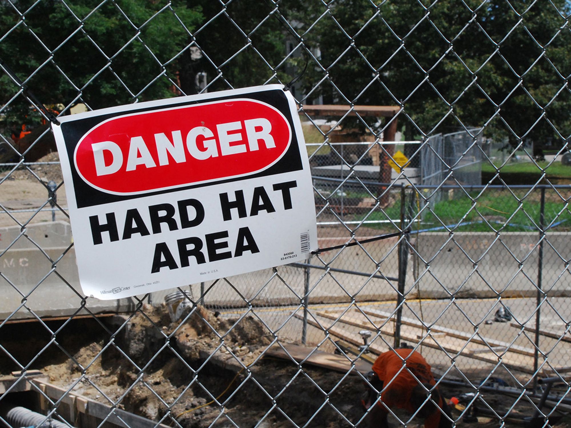 Erect barriers to protect workers from falling objects