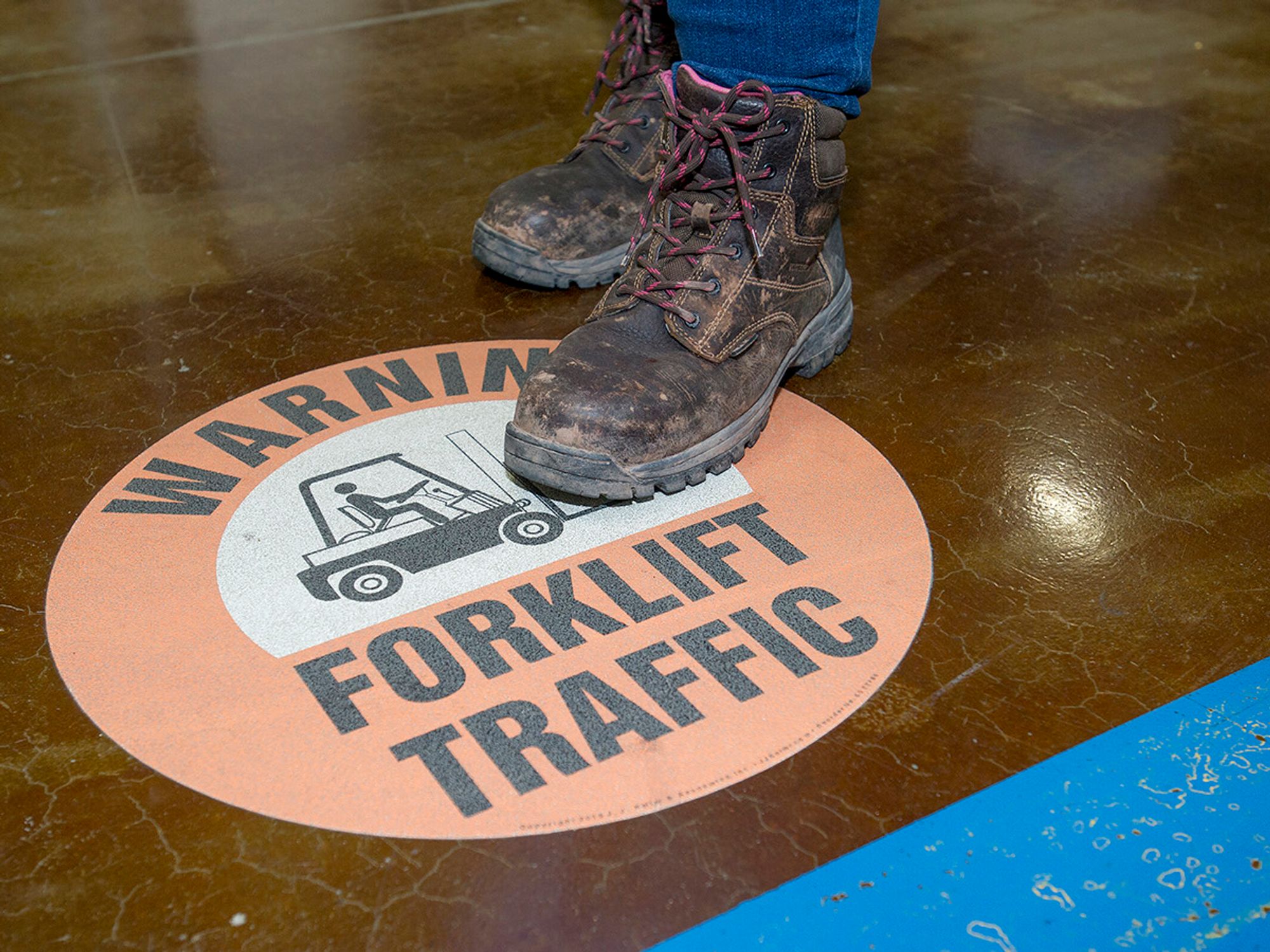 How do employees operate safely around pedestrians?