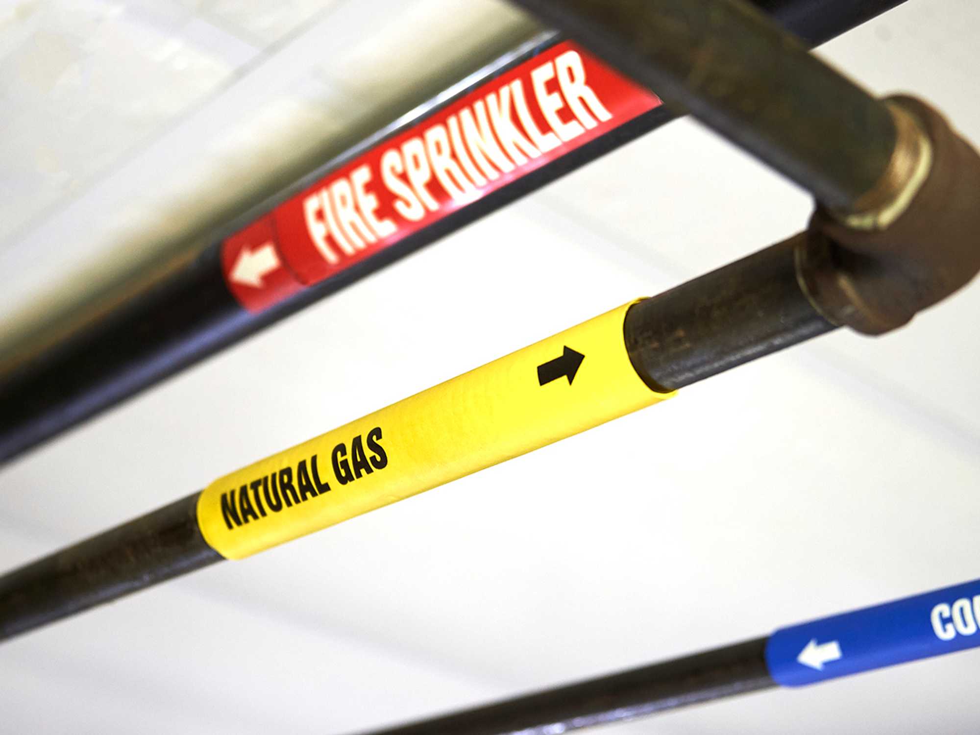 Pipe marking elements, format, color schemes, and location