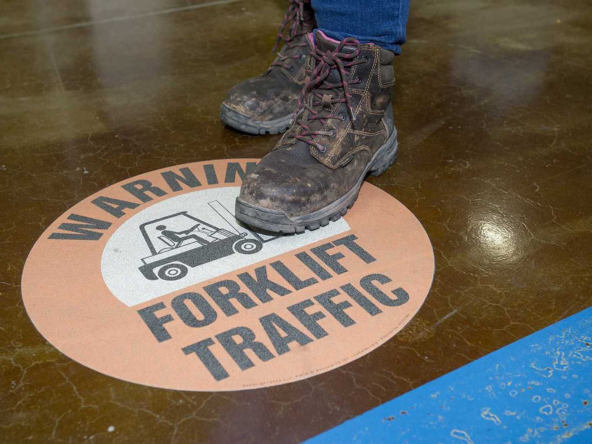How do employees operate safely around pedestrians?