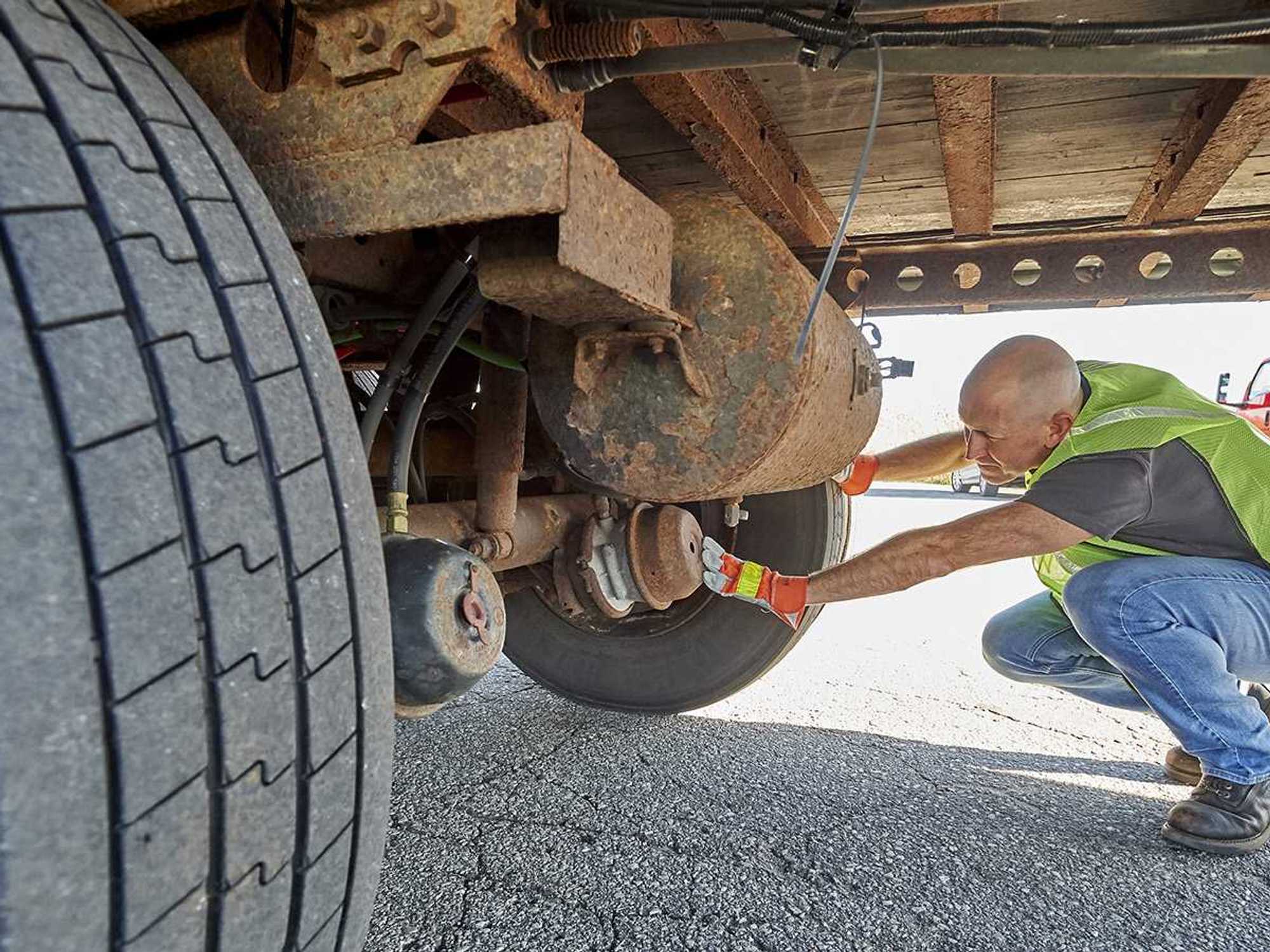 Automatic brake adjusters and indicators